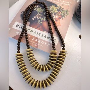 Fun statement chunky wooden style necklace.